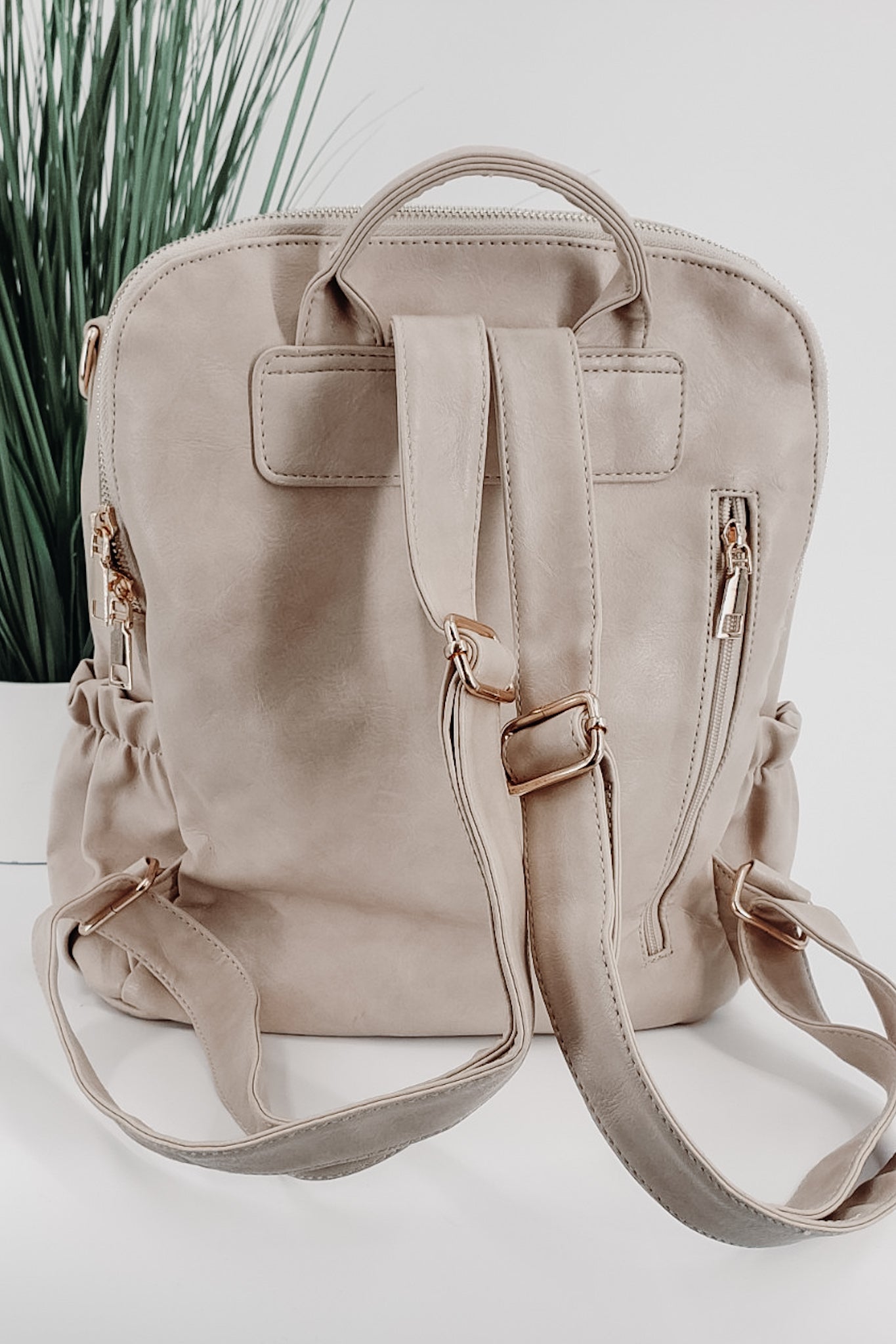 Bone Tassel Backpack